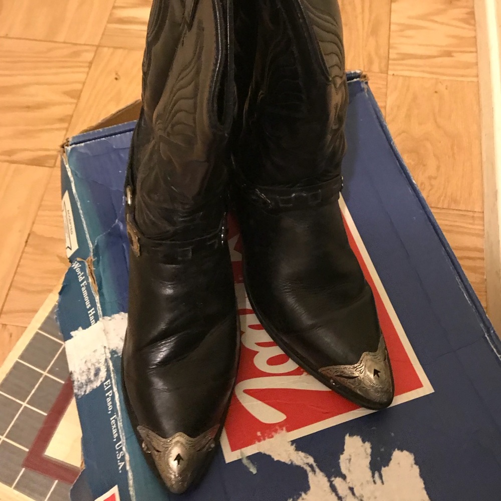 Black western boots with silver accessories